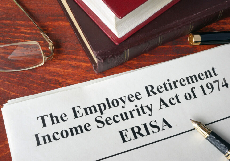ERISA The Employee Retirement Income Security Act of 1974  on a table.